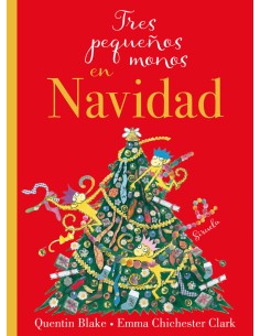 Tres pequenos monos en Navidad